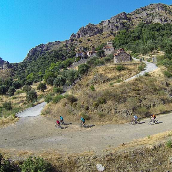 mountain biking past tiny villages
