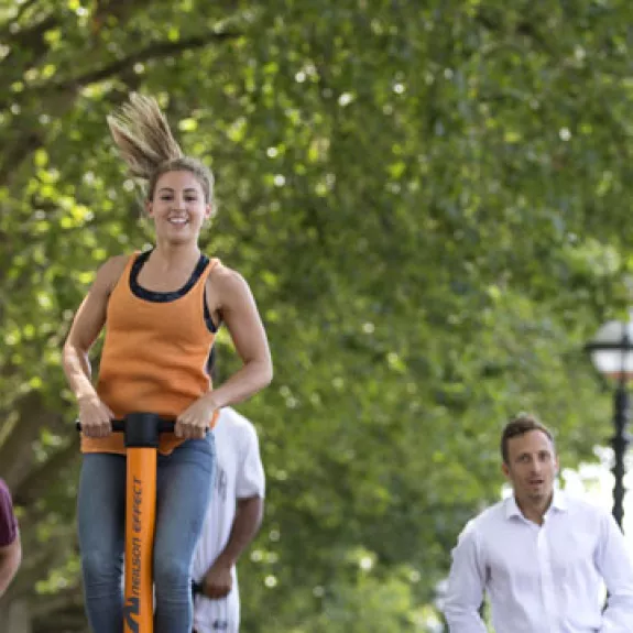 girl on Pogo stick in Londin