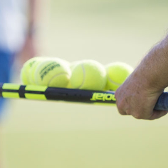 people on tennis court