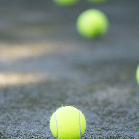 Tennis balls on a tennis court