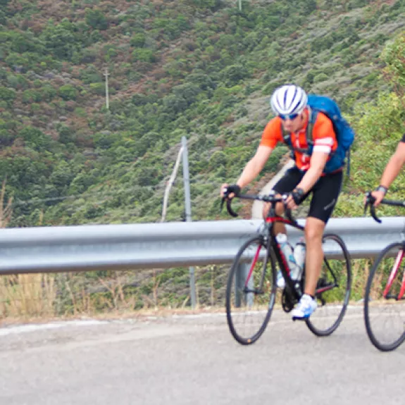 4 people on road bikes