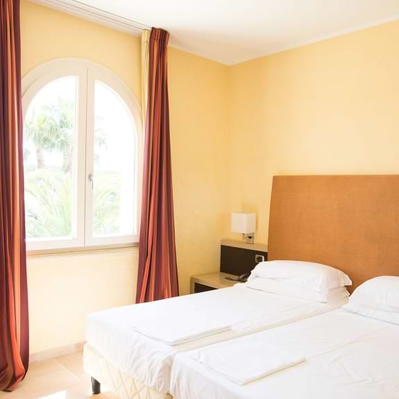 hotel club twin bedroom