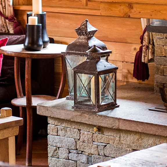 lounge and open fire in a Neilson ski chalet