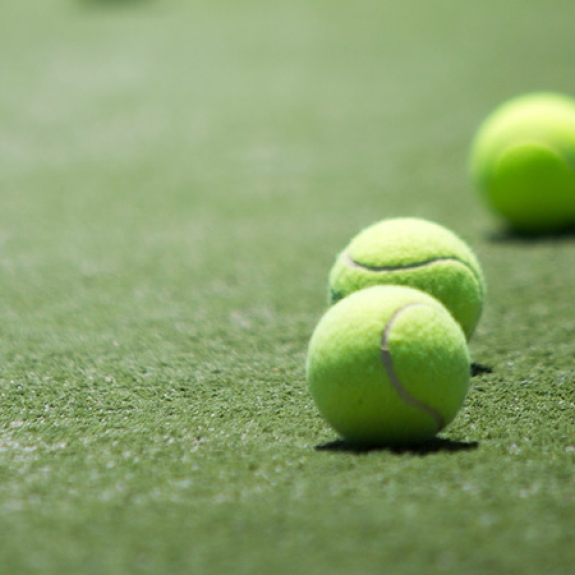 tennis balls on a tennis court