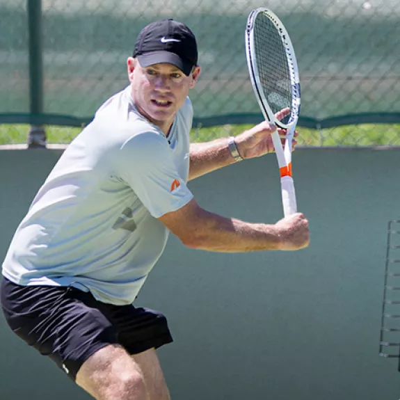Mark Petchey playing tennis at Messini Beachclub in Greece