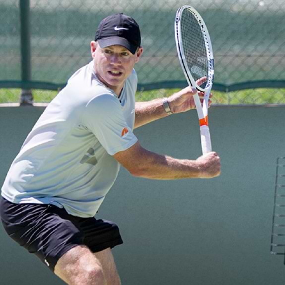 Mark Petchey playing tennis at Messini Beachclub in Greece