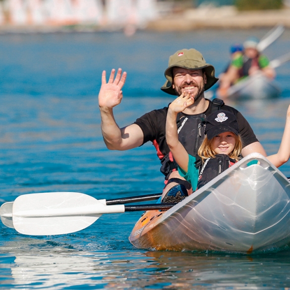 Father and daughter on a kayak