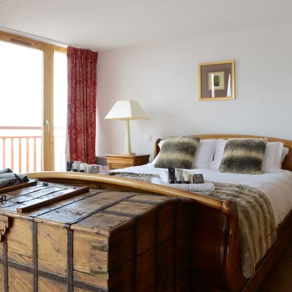 The bedroom in the exceptional suite