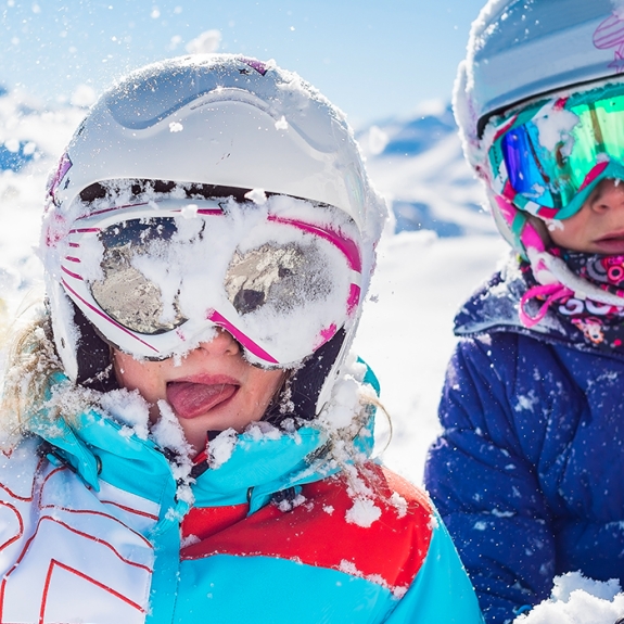 Family playing in the snow