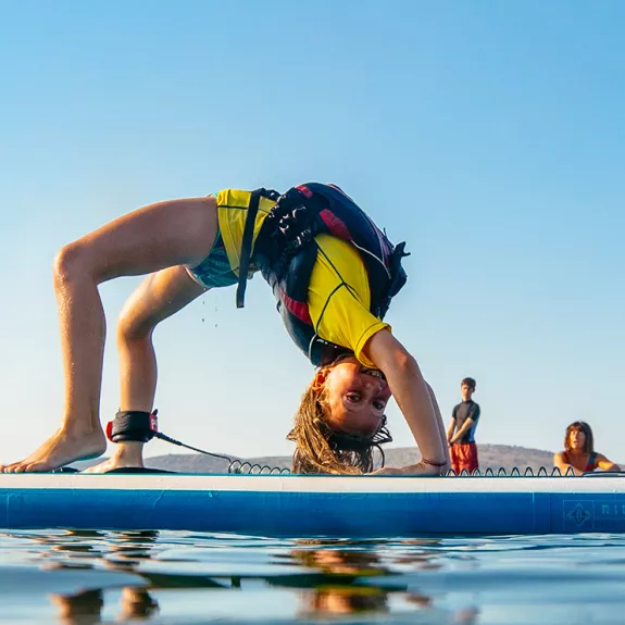 boy on paddle board