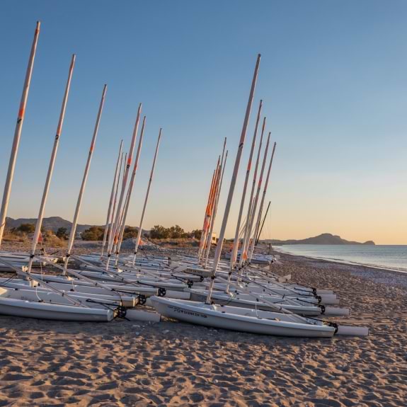 Dinghies on the beach at Levante Beach Club