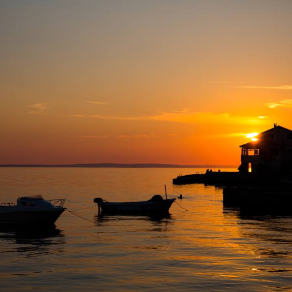 Local village at sunset near Alana Beach Club 