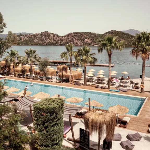 Swimming pool and beach front at Neilson | Cook's Club Adakoy