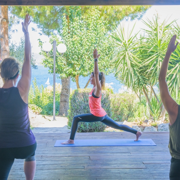 Early morning yoga at Vounaki Beach Club