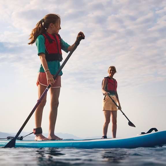 people paddle boarding