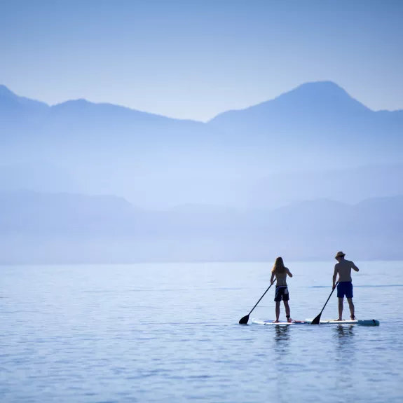 Paddle boarding at Buca Beach Club
