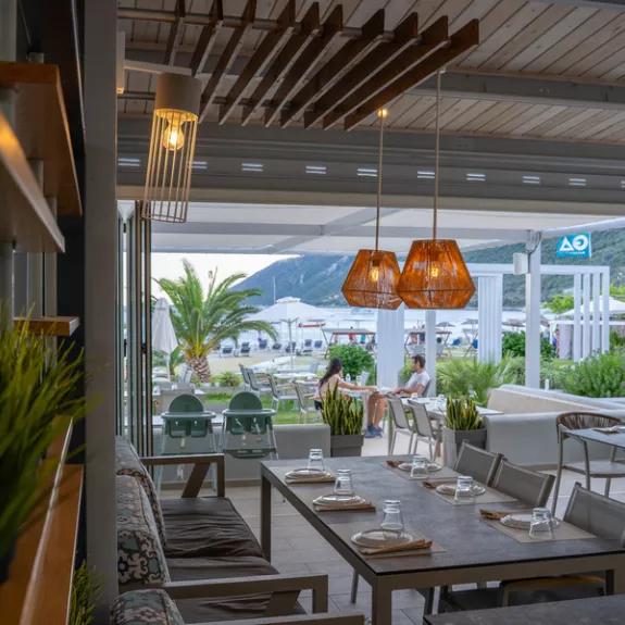 Restaurant and outdoor seating at Cosmos Beach Club