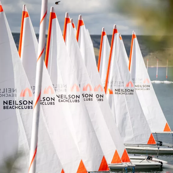 Dinghies lined up at Alana Beach Club