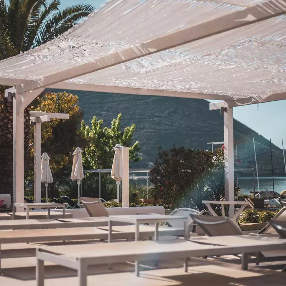 Beachfront terrace at Cosmos Beach Club