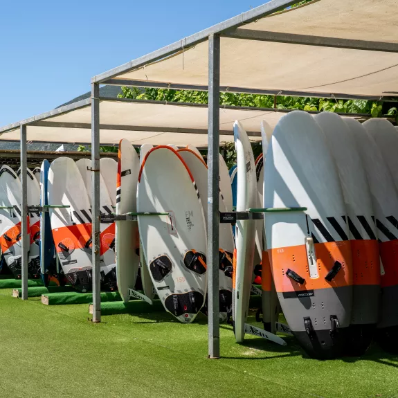 Windsurf boards at Cosmos Beach Club