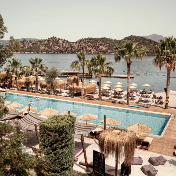 Swimming pool and beach front at Neilson | Cook's Club Adakoy