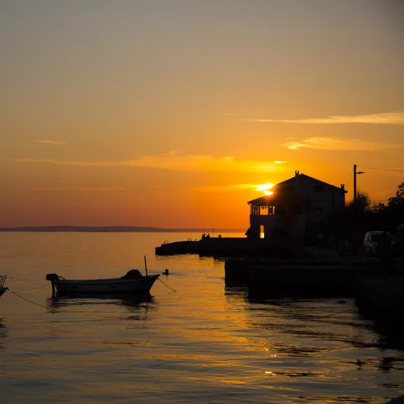 Local village at sunset near Alana Beach Club
