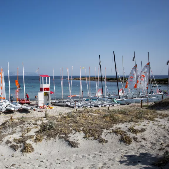 Sailing boats on the beach at Baia dei Mori Beach Club
