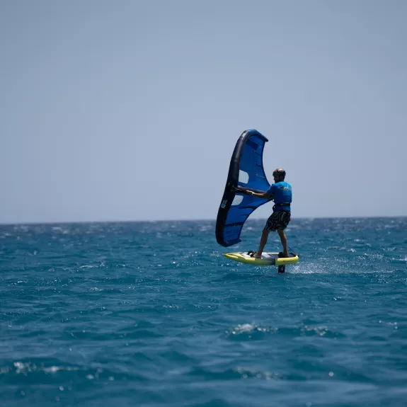 a man wing foiling