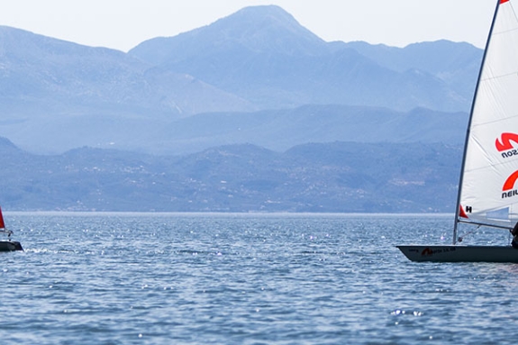 two people sailing Laser Dinghies