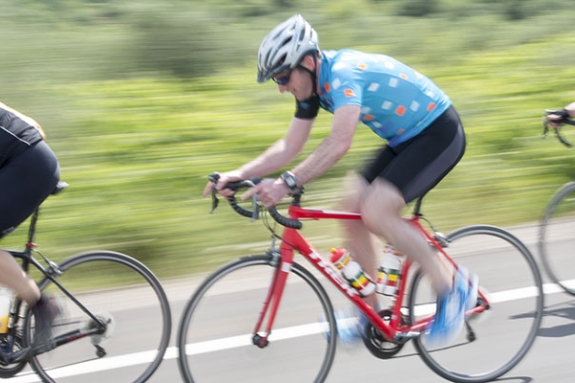 Group of people road cycling in Greece