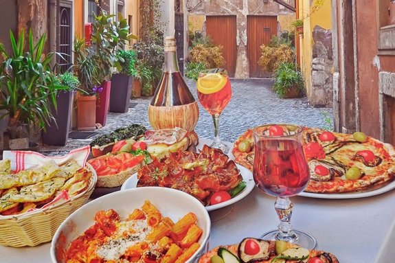 Italian food and drink on a restaurant table