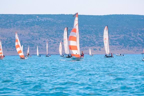 group of people dinghy sailing in Croatia