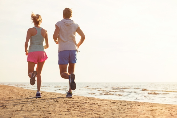 couple running on a beach