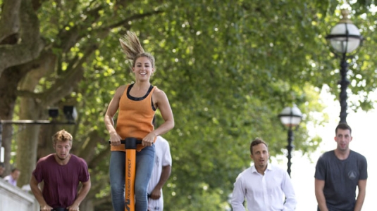 girl on Pogo stick in Londin