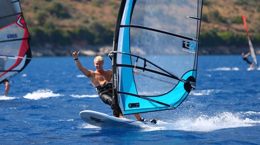 Man windsurfing in Greece