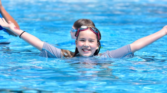 young girl in swimming pool