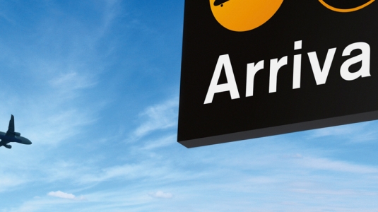 arrivals sign at airport