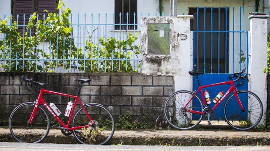 If you’re new to road biking, it may feel as though your body is being positioned unnaturally far forward but you’ll soon get used to it.  There are three key road riding positions.  ‘Neutral’ (with your hands on top of the handlebars allowing easy access to the brakes and gears) is the best position for extended periods of time as there is less pressure on your hands. The ‘drops’ (positioning your hands on the lower part of the C shaped handlebars) position is best for descending along lengthy, steep incli