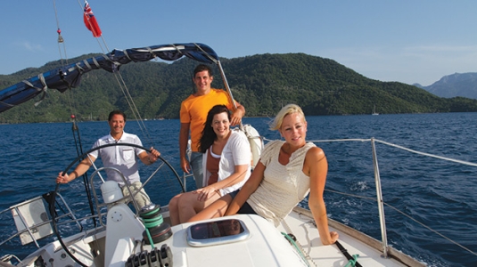 people sailing a yacht