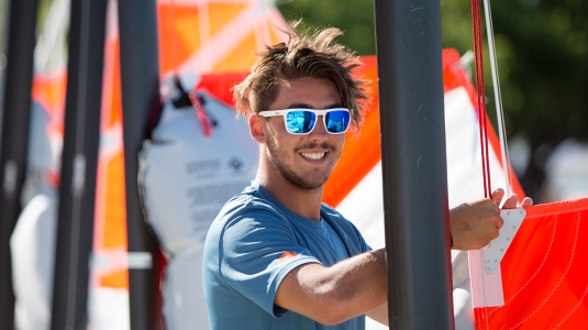 Neilson instructor rigging a sail