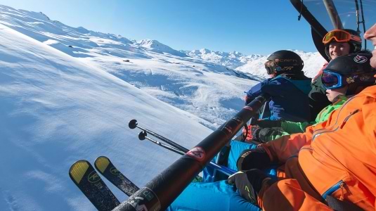 family on a ski lift
