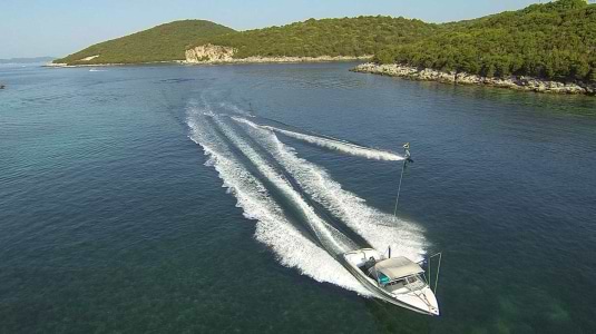 wakeboarding behind a boat