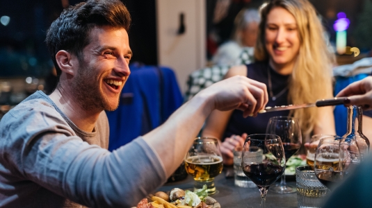 people eating and drinking