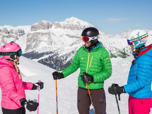 Skiers in Val di Fassa