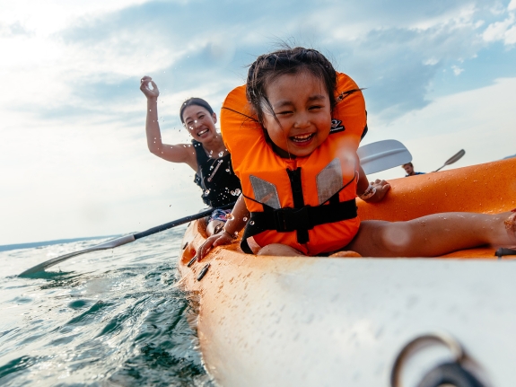 mum and child on kayak