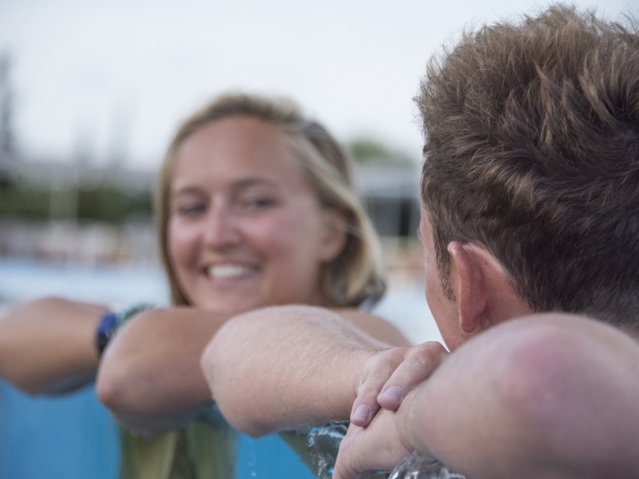 young couple in swimming pool