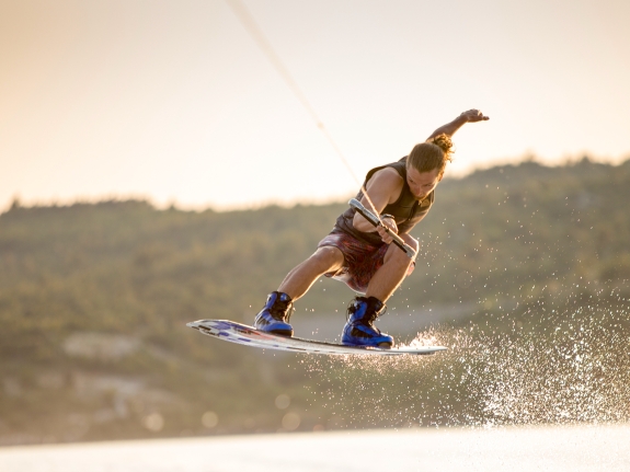 MAN WAKEBOARDING