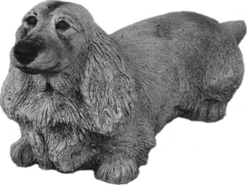 Langhåret gravhund - havefigur i beton