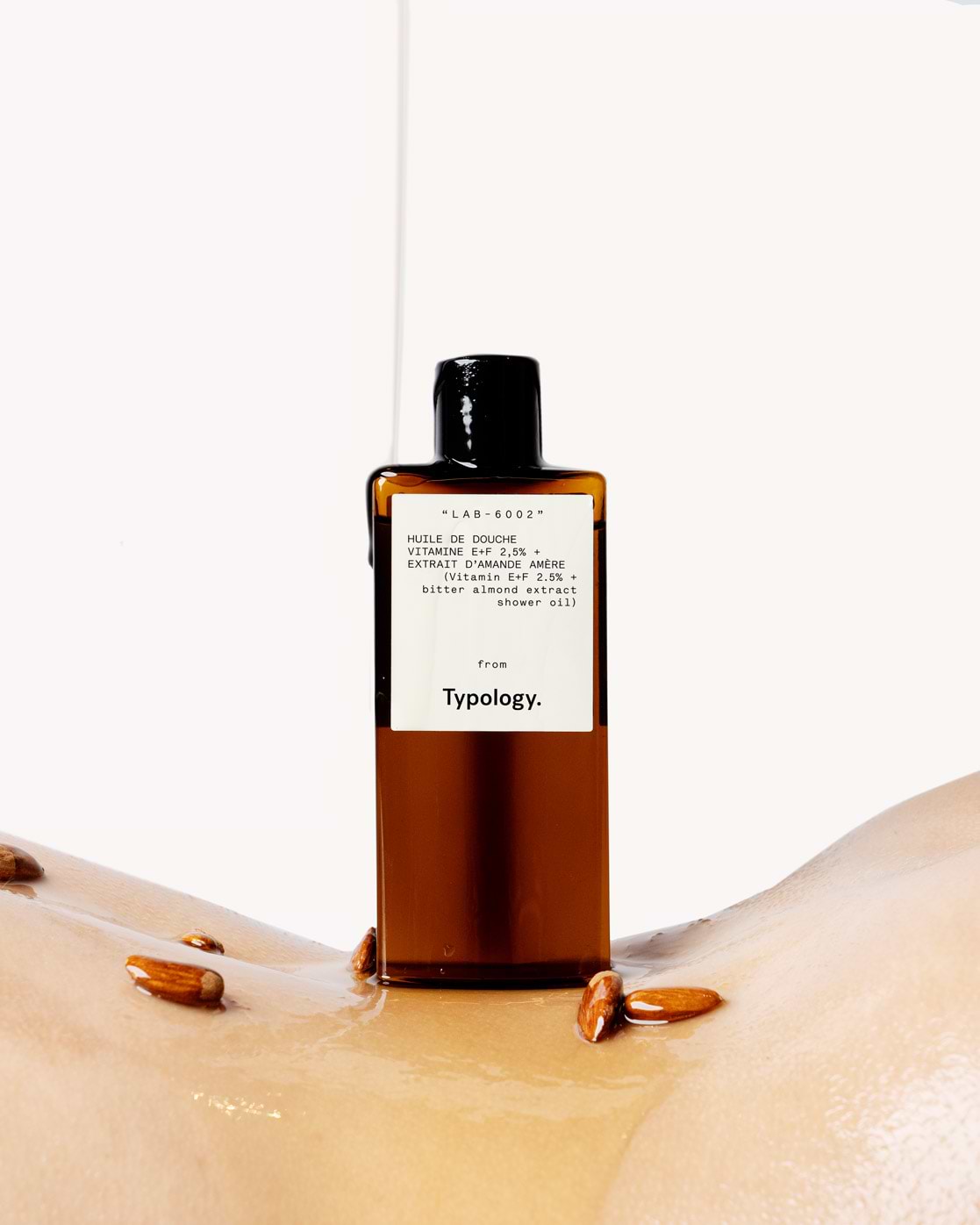 Huile de douche relipidante Vitamine E+F 2.5% + Extrait d’amande amère  — Typology