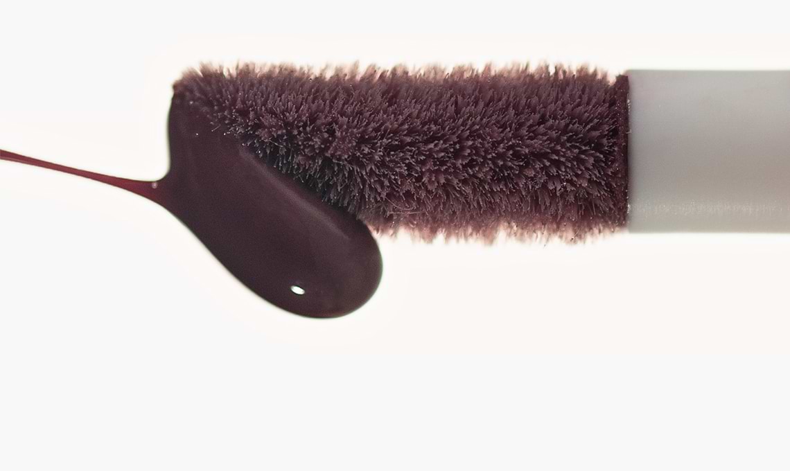 Correcteur de teint violet.